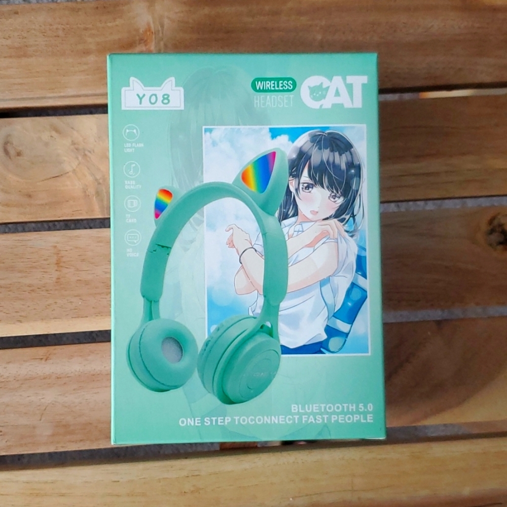 Wireless headset in green. BRAND NEW IN BOX